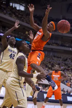 Syracuse forward C.J. Fair loses control of the ball while driving the basket at the Petersen Events Center on Saturday. Pitt defeated the Orange 65-55 in the Big East matchup. Fair scored a game-high 20 points on 9-13 shooting. 