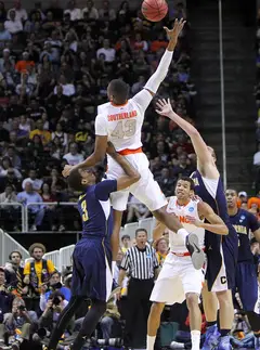 James Southerland #43 of the Syracuse Orange jumps up for a pass during the game against the California Golden Bears .
