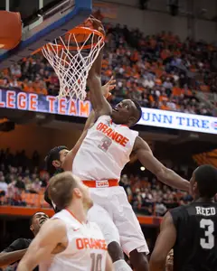 Jerami Grant breaks through the Bearcat defense and dunks the ball in the paint. 