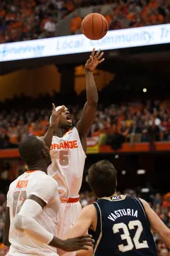 C.J. Fair flips up a shot from the inside during Syracuse's win over Notre Dame. After his career night on Saturday, Fair shot just 2-of-13 for six points against the Irish.
