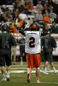Rice raises his hands in celebration. Syracuse pulled out a 10-8 win for its second straight victory. 