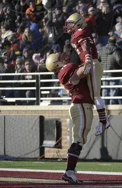 BC wide receiver Sherman Alston is lifted in the air after hauling in a 26-yard touchdown pass in the second quarter.