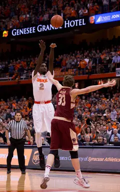 Johnson rises for a mid-range jumper over BC guard Patrick Heckmann. The SU sophomore missed both shots he took in the first half.
