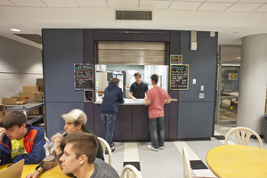 Students order food at The Breezeway Cafe in the lobby of DellPlain Hall. The cafe, which is currently in its soft launch phase, is open Thursday, Friday and Saturday from 10 p.m. to 3 a.m. Milkshakes and pizzas have been two of the most popular items at the cafe thus far.