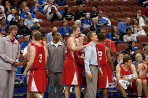 Ryan Wittman holds then-Cornell head coach Steve Donahue's shoulder during the Big Red's NCAA tournament run in 2010. Wittman now serves as a graduate manager for Donahue at Boston College.