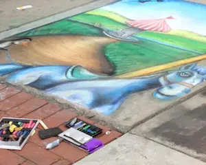 Montgomery Street transformed into the Chalk Zone on Saturday during the 24th annual Syracuse New Times Painting Festival. Artists of all ages and skills competed for cash and  prizes from local businesses.
