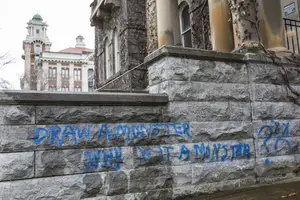 Smith Hall was one of several Syracuse University buildings spray-painted with cryptic messages during a graffiti spree last December. 