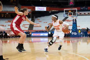 Syracuse guard Brittney Sykes maneuvers around the perimeter during the Orange's win over Cornell on Sunday, in which the junior made her return back to the court after tearing her ACL and meniscus in March.