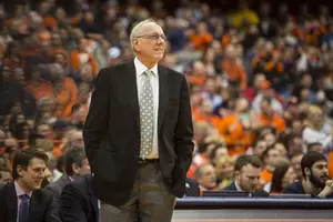 Syracuse head coach Jim Boeheim, pacing the sideline here against Florida State on Sunday night, will have to rearrange his rotation with freshman forward Chris McCullough's status in the air.