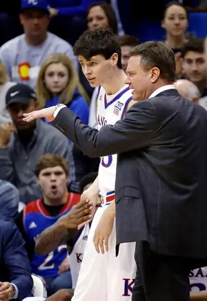 Kansas student manager Chris Huey has suffered three collapsed lungs, but just recently became the first student manager under Bill Self to play in an actual game.