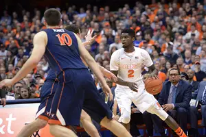 B.J. Johnson looks to make a move while handling the ball on the in the left corner on Monday night. Johnson scored just three points on 1-of-6 shooting in his first career start in a Syracuse uniform.