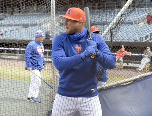 Tim Tebow, making this Triple-A debut on Thursday, taking some warmup swings for the Syracuse Mets. 