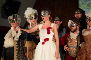 Attendees of the prince's ball gawk at the newfound love between the prince and Cendrillon, played by Alexandra Dubaniewicz. On April 13, SU students performed the opera “Cendrillon,” a French, modern rendition of Cinderella.
