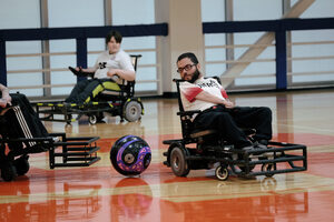 On the basketball court of the Barnes Center, OrangeAbility hosts a game of power soccer. The player, Peyton Sefick, played for the U.S. Power Soccer National team during the 2023 FIPFA Powerchair Football World Cup.