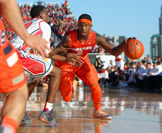 C.J. Fair of the Syracuse Orange drives to the basket against the San Diego State Aztecs during the Battle on the Midway game on Sunday.