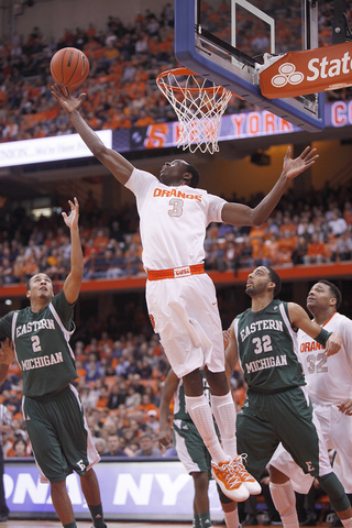 Jerami Grant reaches back to try and grab a rebound against Eastern Michigan on Monday.