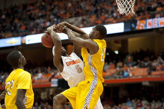C.J. Fair goes up to the rim against Alcorn State forward Stephane Raquil.