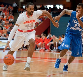 James Southerland pushes the ball up the court.