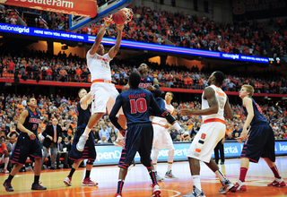 Syracuse center DaJuan Coleman makes a slam dunk during the Orange's win over Detroit. 