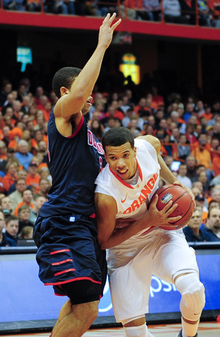 Syracuse guard Michael Carter-Williams drives to the basket.