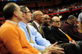 Dave Bing, former teammate of Jim Boeheim and Detroit mayor, watches Syracuse's game against Detroit with athletic director Daryl Gross. Dick Thompson, chairman of SU's Board of Trustees, sits to the far right.