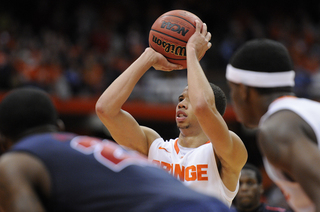 Syracuse guard Michael Carter-Williams attempts a free throw.