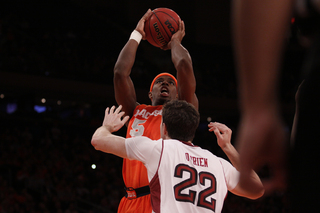 CJ Fair shoots over Jake O
Brien. The junior forward led SU in scoring with a career-high 25 points, and went 8-of-12 from the floor.