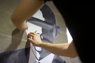 Miller puts the finishing touches on his portrait of President Obama. 