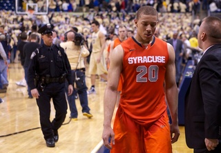 Syracuse guard Brandon Triche leaves the court after the final buzzer at the Petersen Events Center on Saturday. Pitt defeated the Orange 65-55 in the Big East matchup. Triche finished with 14 points on 4-14 shooting.