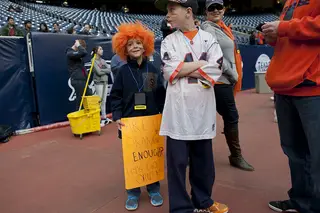 Young fans pose for a picture on the field, more than 1,500 miles away from Syracuse. 