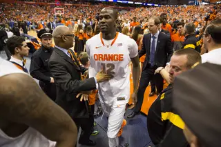 Baye Moussa Keita leaves the floor following Syracuse's 91-89 overtime victory over Duke.