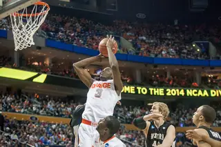 Forward Jerami Grant attacks the basket after eluding the WMU zone.