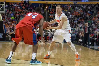 Syracuse guard Trevor Cooney looks for options while catching the ball. 
