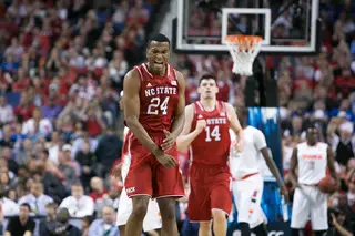 T.J. Warren, the Atlantic Coast Conference's leading scorer, gets fired up as N.C. State maintains a lead over the Orange. 