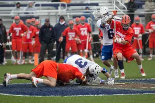Duke faceoff specialist Brendan Fowler (right) wrestles a faceoff away. The senior 24-of-31 faceoffs in the game. 