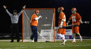 The referee signals a goal against Syracuse, and Bobby Wardwell juggles the ball.  