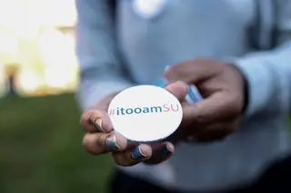 Stephanie Conn, a senior mathematics major, holds an #itooamSU button. The buttons were sold for two dollars each during the 