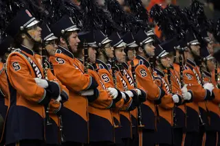 The Syracuse University marching band looks on before the start of the Orange's game against North Carolina State. 