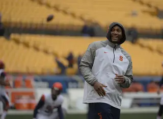 Syracuse quarterback Terrel Hunt stands on the field before the start of SU's game against Pittsburgh.