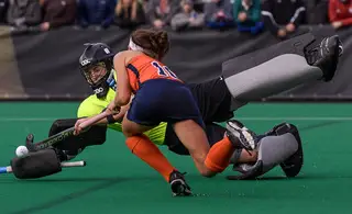 Syracuse senior forward Lauren Brooks tries to dodge UConn goalkeeper Nina Klein and get a shot off. 