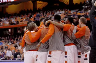 Syracuse huddles before Friday night's game against Holy Cross at the Carrier Dome.