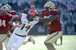 Freshman Ervin Philips tries to fight for extra yardage as a couple Boston College defenders give chase. 