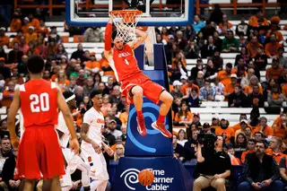 Big Red senior big man Dave LaMore finishes off a dunk in the second half. He finished with four points in 19 minutes.
