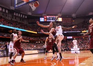 Players from both SU and BC go up for a rebound. Syracuse out-boarded the the Eagles 37-35.