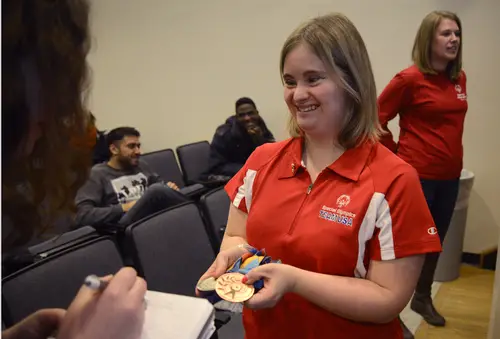 Kayla McKeon, a 27-year-old Syracuse native with Down syndrome, shared her experiences with the “R-word” as the Special Olympics Club’s guest speaker on Wednesday. 