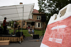 Neighborhood art festival, Art on the Porches, is more than an art festival. Local artists play on a makeshift stage and help create an ambiance of family fun.
